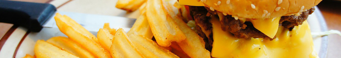 Eating Burger Tex-Mex Pub Food at The Brass Rail restaurant in Beloit, WI.